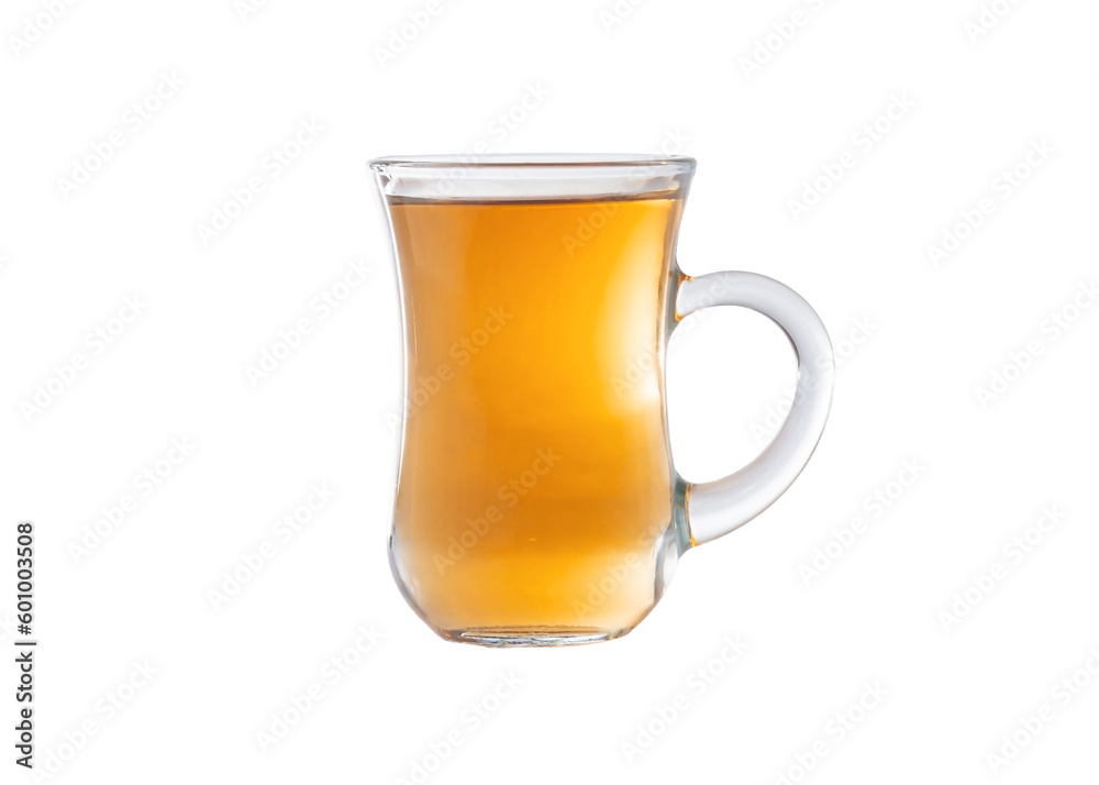 Amber color tea in a transparent glass cup. Cup isolated on a white background. Amber color tea in a transparent glass cup. Cup isolated on a white background.