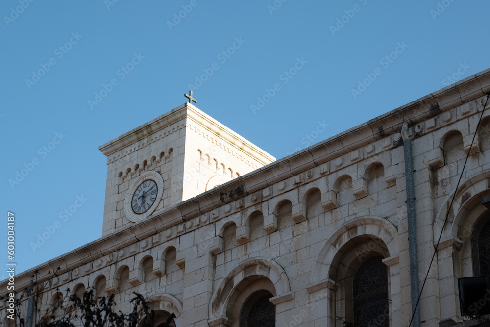 Fototapeta premium Nazareth, Israel - August 16, 2021: Tower of the St. Joseph's Church in the Old City of Nazareth, Israel