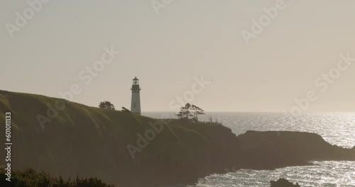 Yaquina Head at Sunset, Oregon Coast Lighthouse evening shot, peaceful Newport Scene, Depoe Bay, Oregon Beaches photo