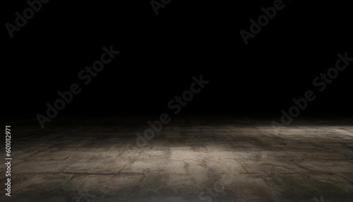 Cement floor with light in the dark background.  