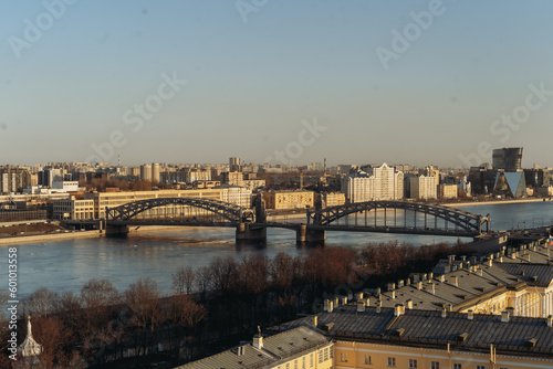 aerial view of saint petersburg. bolsheokhtinsky bridge, Neva river and roof tops on summer evening © Yulia Raneva