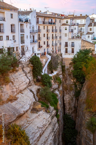 Puente Nuevo in Ronda, in the province of Malaga, overlooking the gorge and hanging houses during a sunny summer day