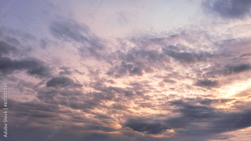 abstract background of dramatic cloudy sunset sky golden hour