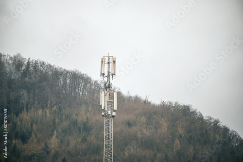 A cell phone LTE and 5g tower with a sky background