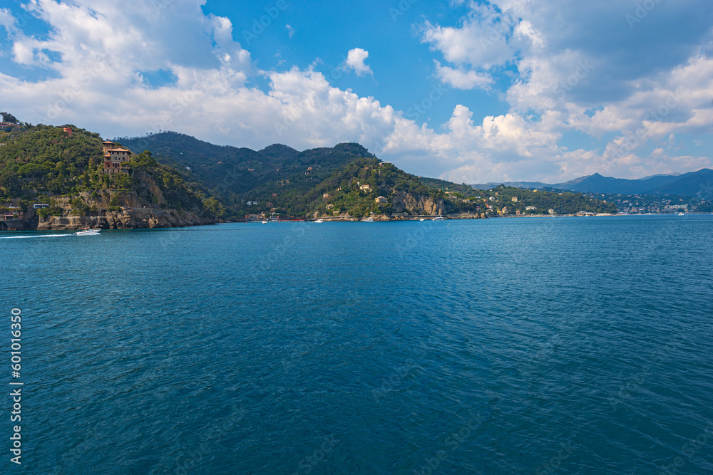 Coast of the famous village of Portofino, with the bay of Paraggi and Santa Margherita Ligure town.Luxury tourist resorts in Genoa Province, Liguria, Italy, Europe.