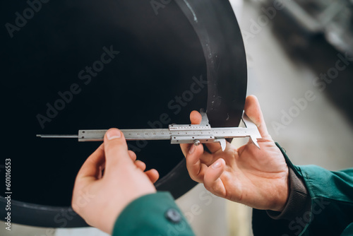 caliper, measures the thickness of the pipe