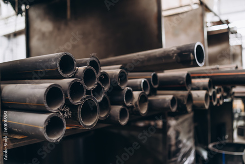 pattern on pile of HDPE pipes, industrial background