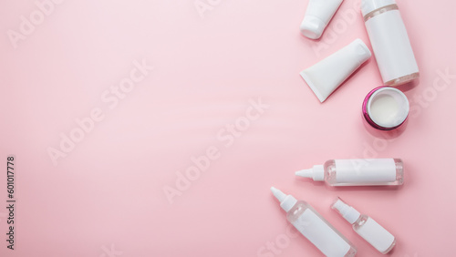 Facial cosmetics, weight gain product, natural cosmetics, flat image on pink. copy space