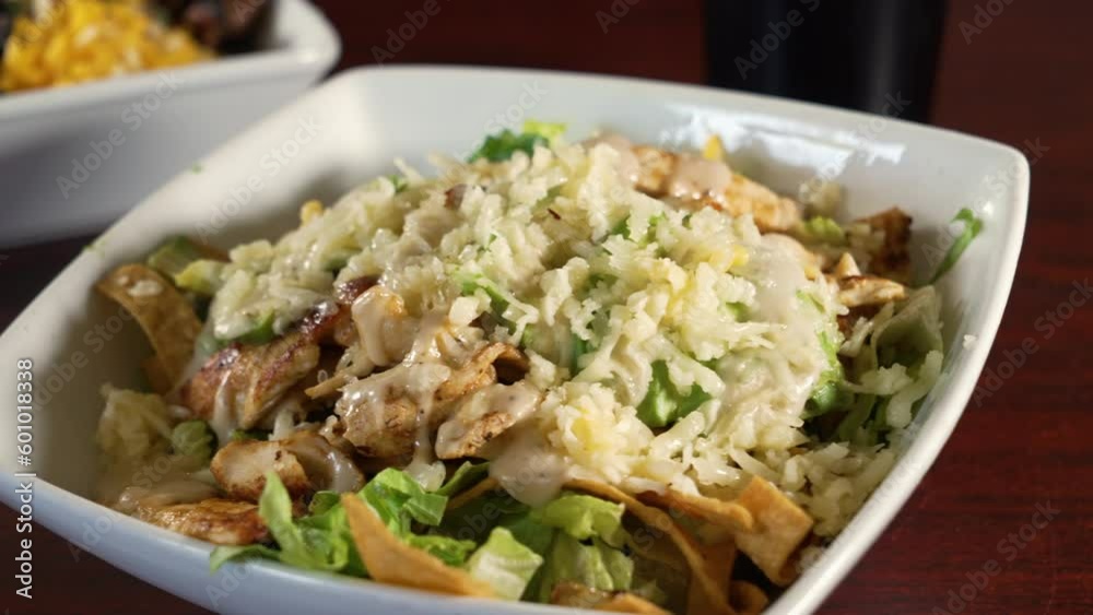 Chicken fajita salad with shredded cheese and tortilla strips, slider 4K Chicken fajita salad with shredded cheese and tortilla strips, slider 4K