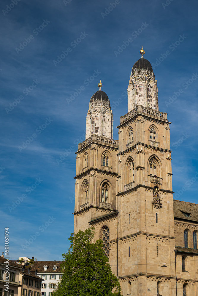 Twin bell towers of Grossmunster church in Zurich city Switzerland, Wide-angle view, blue sky, no people