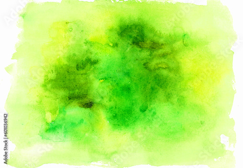 Abstract green background. Watercolor blur. Different shades of green, yellow and white around the edges.