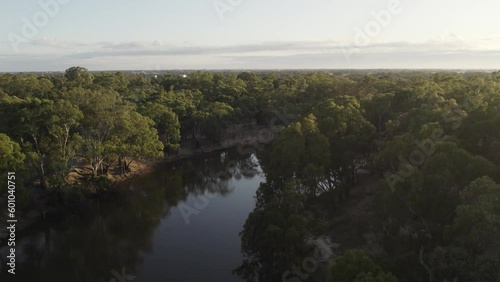 Revealing shot of river Murray at sunset on calm afternoon.  photo