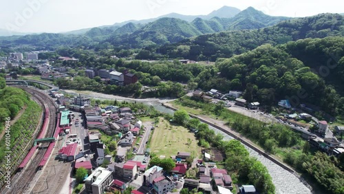 The Small Valley Town near Minakami Station in the Gunma Prefecture of Japan. Tone River Can be Seen Flowing Below. photo