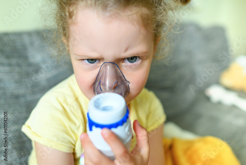 The child is angry and does not want to breathe through the inhaler.