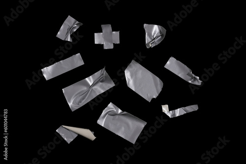 Photo isolated silvertape pieces on black background