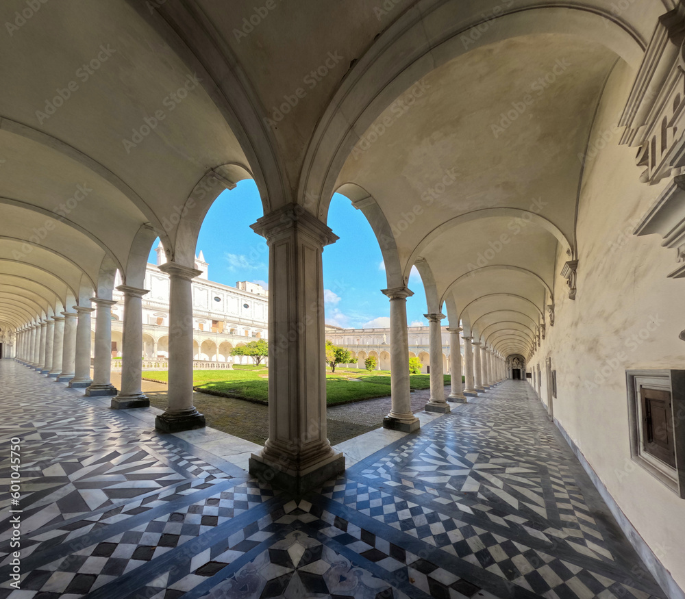 View of the cloister of the ancient Benedictine monastery of San Martino, now transformed into a museum of history and art in Naples, Italy.