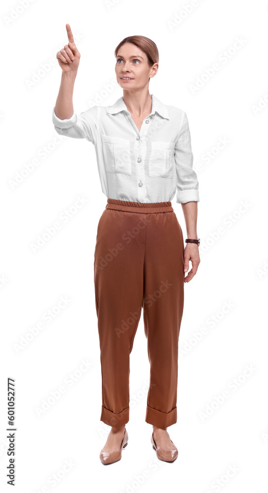 Beautiful business woman pointing on white background Beautiful business woman pointing on white background