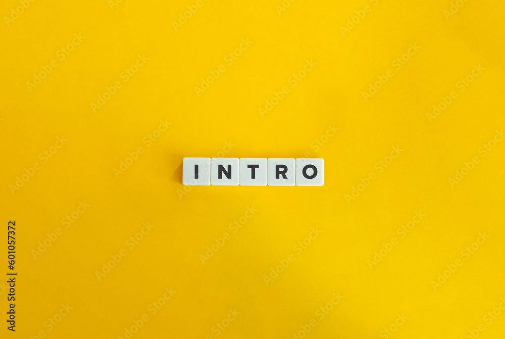 Intro Word and Concept. Block Letter Tiles on Yellow Background. Minimal Aesthetics. - obrazy, fototapety, plakaty 