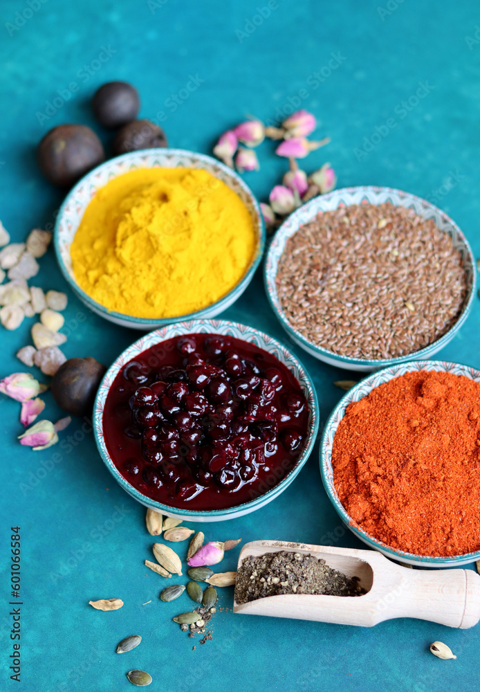 Fototapeta premium Composition with different spices on color background, top view. Space for text