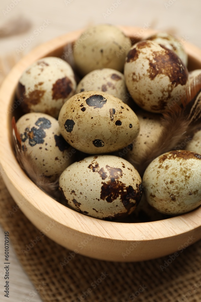 Speckled quail eggs on table, closeup view Speckled quail eggs on table, closeup view