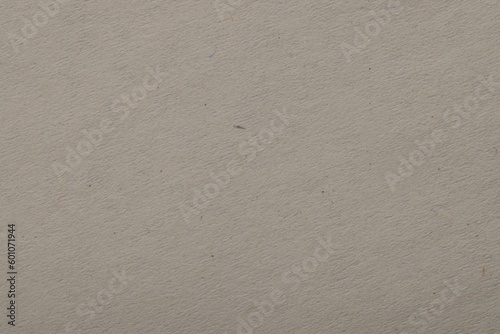 Texture of light grey paper sheet as background, top view