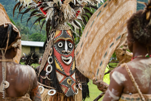 Crocodile festival in Ambunti, Sepik area in Papua New Guinea with crocodils and mask.