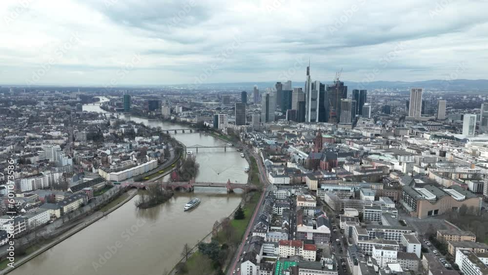 Gaze upon the breathtaking beauty of Frankfurt's skyline with stunning aerial drone footage of the city's towering skyscrapers and bustling streets. Gaze upon the breathtaking beauty of Frankfurt's skyline with stunning aerial drone footage of the city's towering skyscrapers and bustling streets.