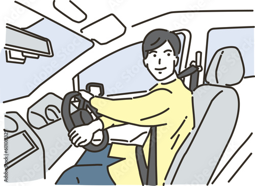 笑顔で運転をする若い私服姿の男性