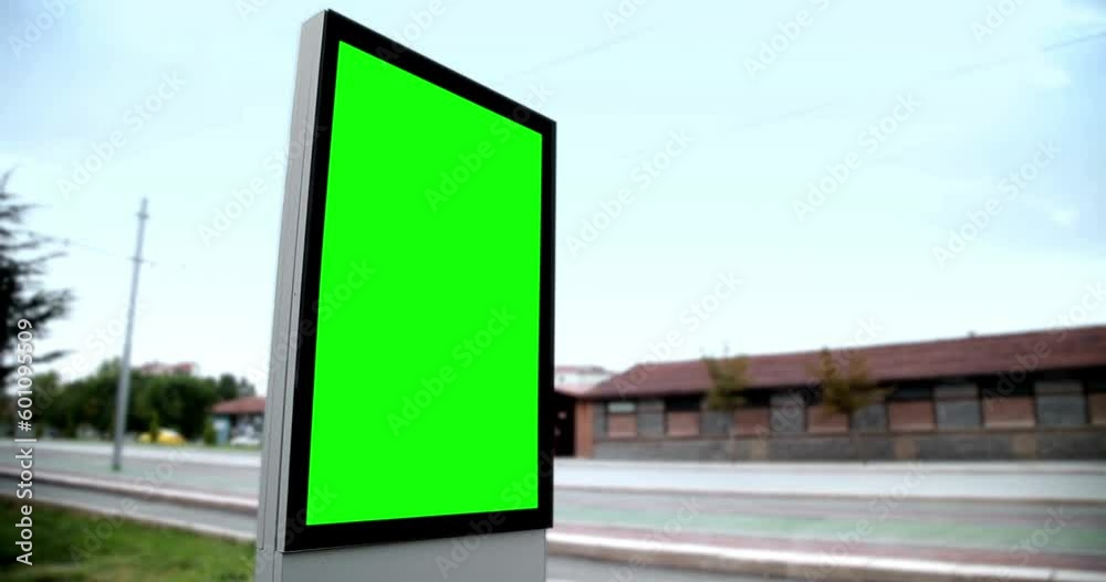 big green screen chroma key template for ads footage picture in street