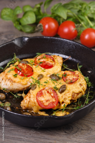 Chicken breast with cheese and tomatoes