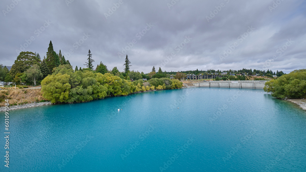 Fototapeta premium Lake Tekapo Dam and its turquoise water.