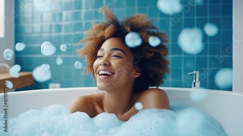 Afro-American woman taking a bubble bath in a bathtub