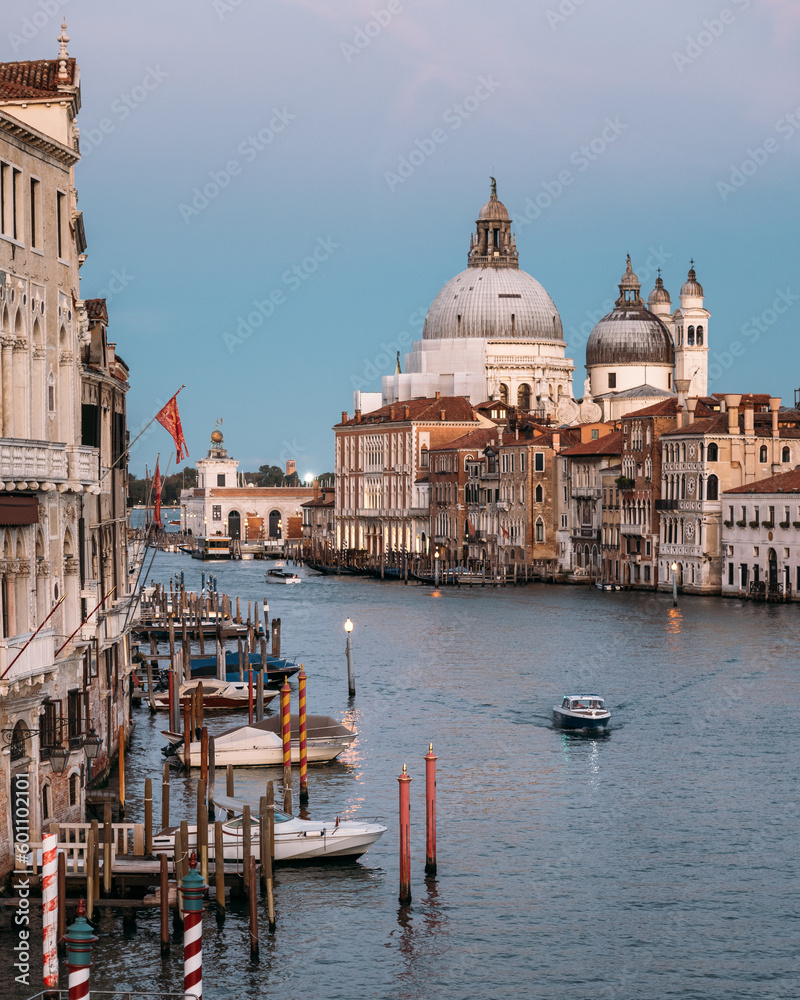 Scenic view of the Salute Roman Catholic church and minor basilica located in Punta della Dogana in the Dorsoduro sestiere of the city of Venice Italy on a cloudless summer evening. Copyspace