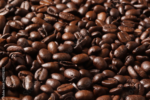 MACRO PHOTOGRAPHY OF ROASTED COFFEE BEANS. FOOD CONCEPT.