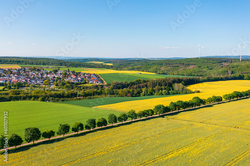 Aerial view of the Taunus landscape with flowering rapeseed fields near Hünstetten - Germany