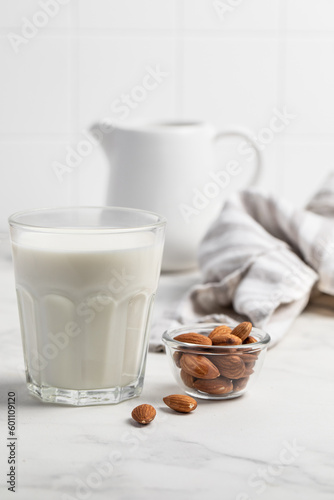 Almonds, a glass of milk. lactose free milk. Healthy food. Almond milk.