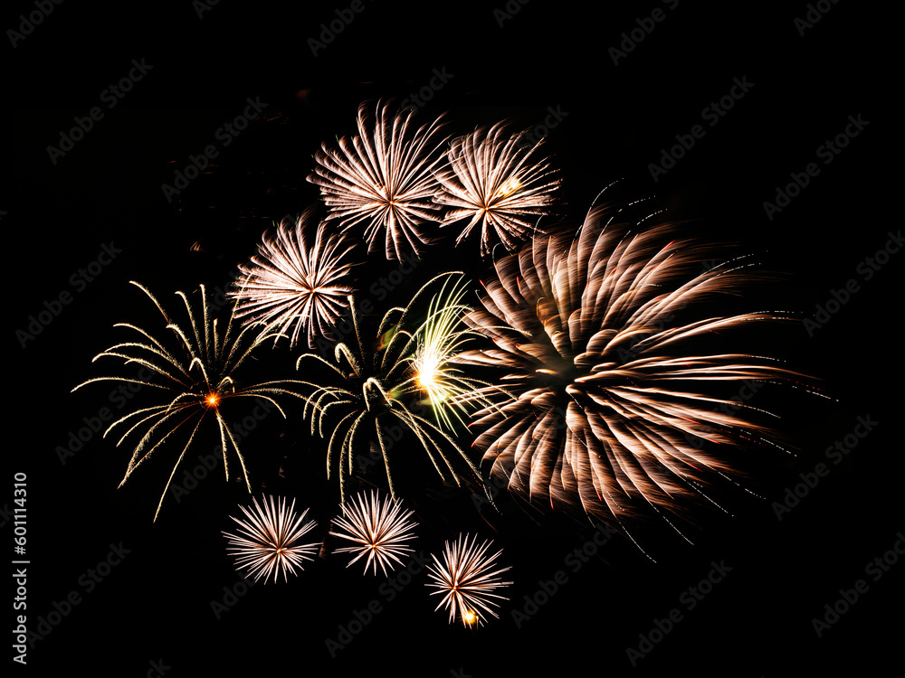 Multiple fireworks against the deep black sky. Bright display of the fireworks Multiple fireworks against the deep black sky. Bright display of the fireworks