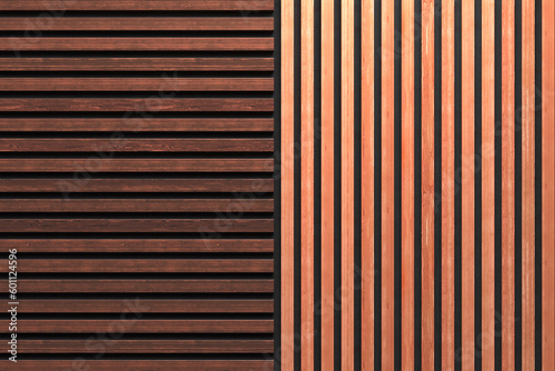 A wall of wooden slats in the color of natural light wood and dark wood with a pattern of wall panels in the background