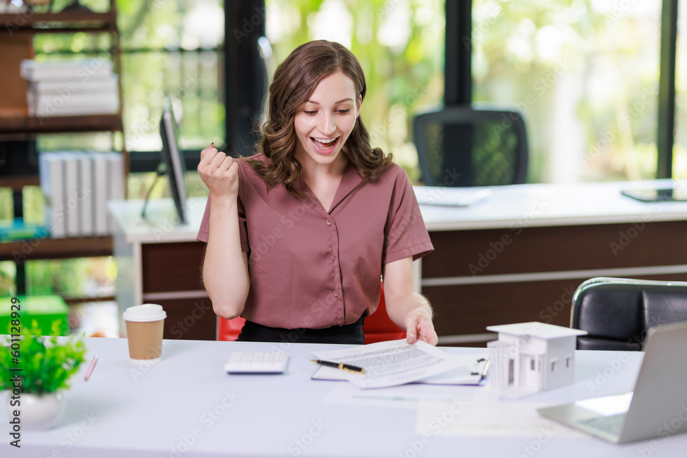 Home sales,home rental and real estate concept.Real estate agent happy after home purchase or rental agreement from client