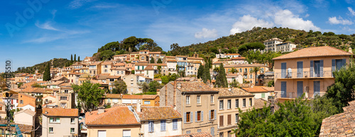 Fotografie, Tablou Panoramic view of the hilltop town of Bormes les Mimosas in the south of France