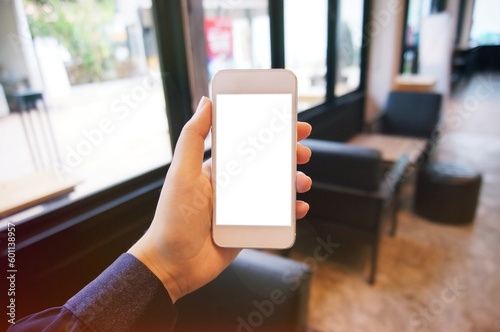 Close up of women's hands holding cell telephone blank copy space screen. smart phone with technology concept