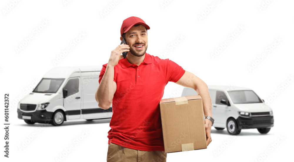 Delivery man with a van holding a package and using a mobile phone Delivery man with a van holding a package and using a mobile phone