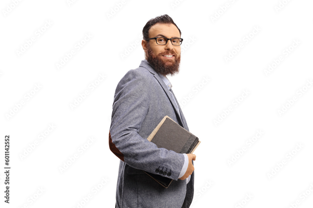 Bearded man with glasses holding books and smiling Bearded man with glasses holding books and smiling