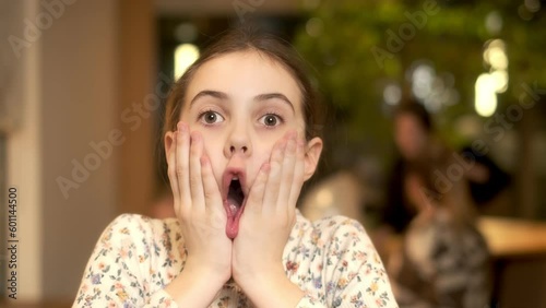 Portrait of a beautiful girl making different grimaces