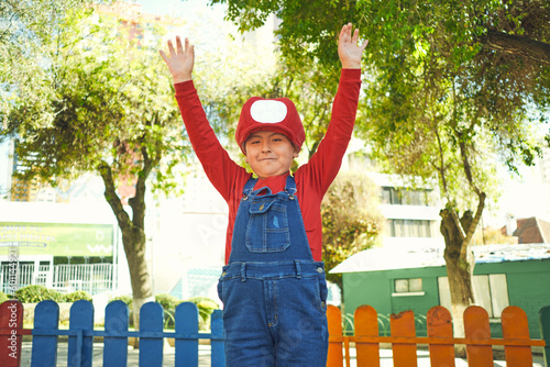 Canvas Print Super Fun in La Paz: Boy in Mario Bros Attire Explores Outdoor Playground in Bol