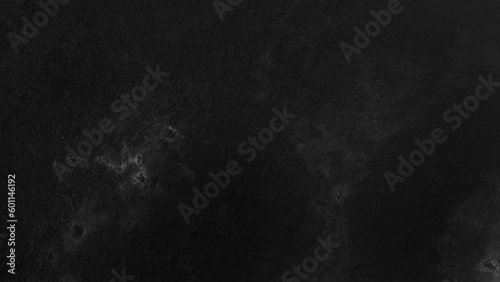 black grainy marble stone tile in close up view. macro shot of dark black marble texture background, abstract texture for design. luxury and elegance marble for decoration.