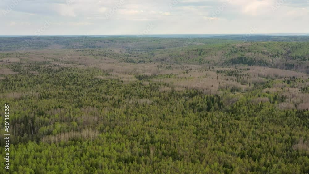 Southern Urals in spring, a view of the mountain taiga from the air. Southern Urals in spring, a view of the mountain taiga from the air.