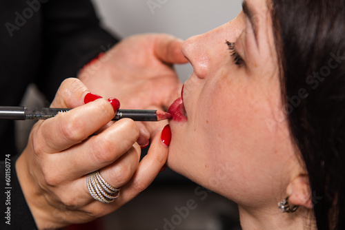 Eyebrow and lip correction procedures for facial rejuvenation in the beauty salon