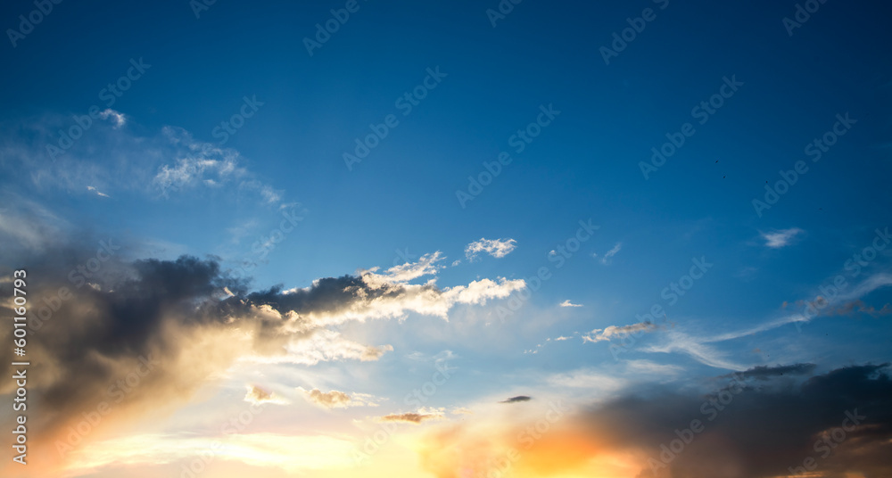 Beautiful bright summer sunset sky with clouds. Sunset sky  clouds background.