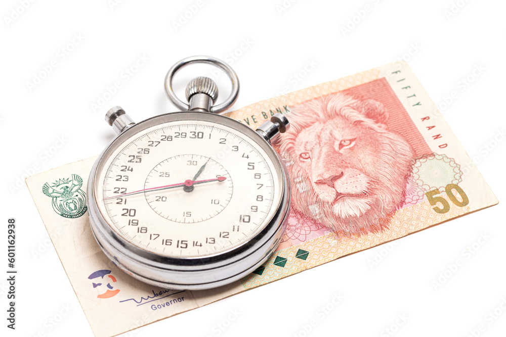 Time is money concept, stopwatch on South African money 50 rand banknote. Time is money concept, stopwatch on South African money 50 rand banknote.